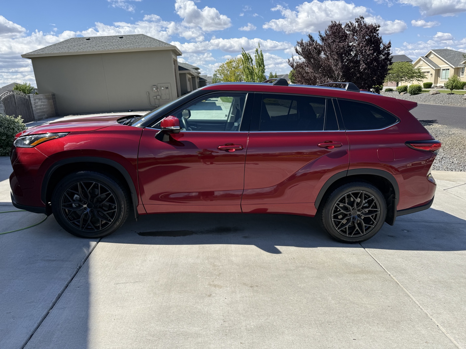 Red Toyota Highlander freshly detailed by No Name Detailing