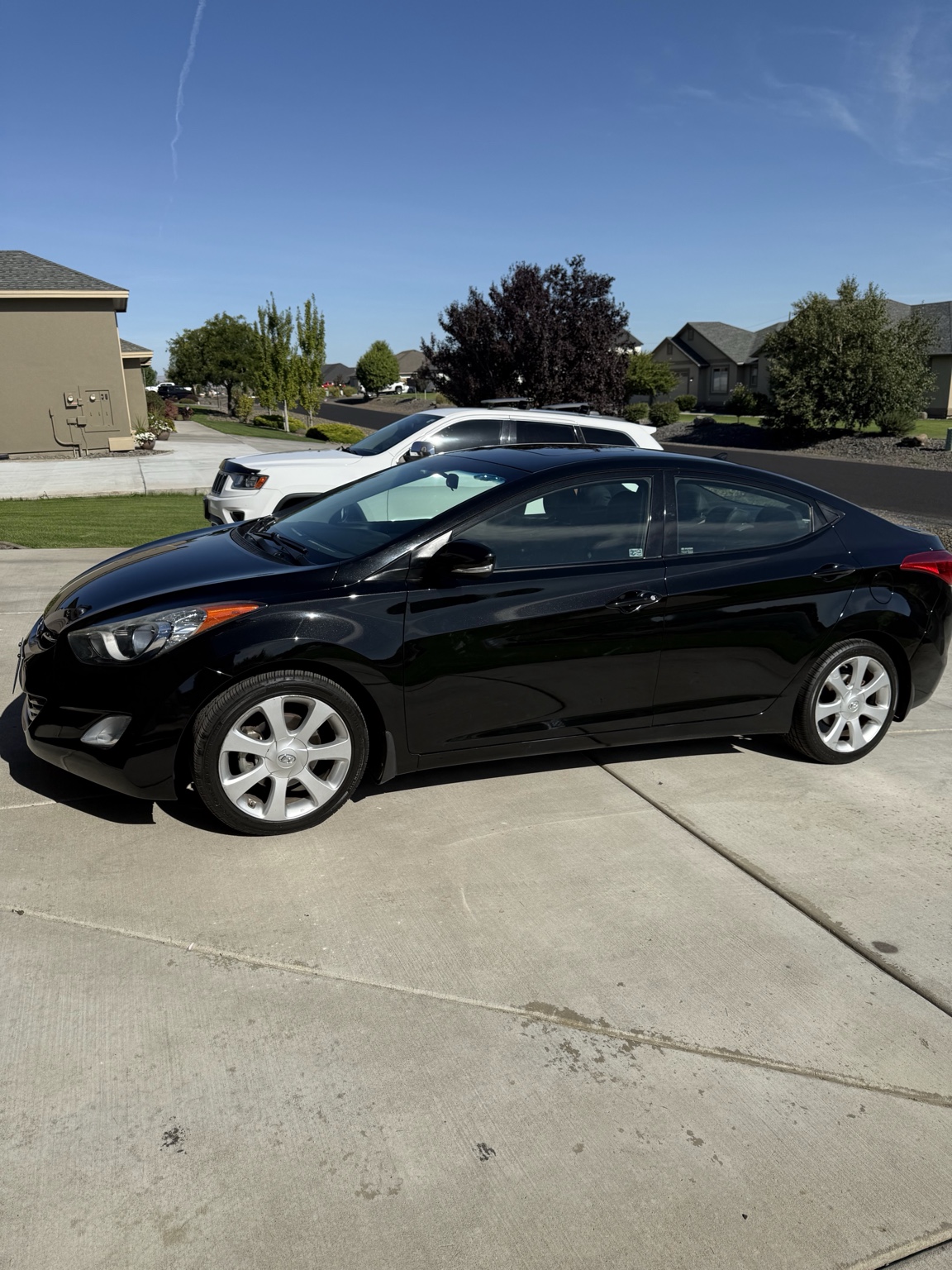Black Hyundai sedan after exterior detailing